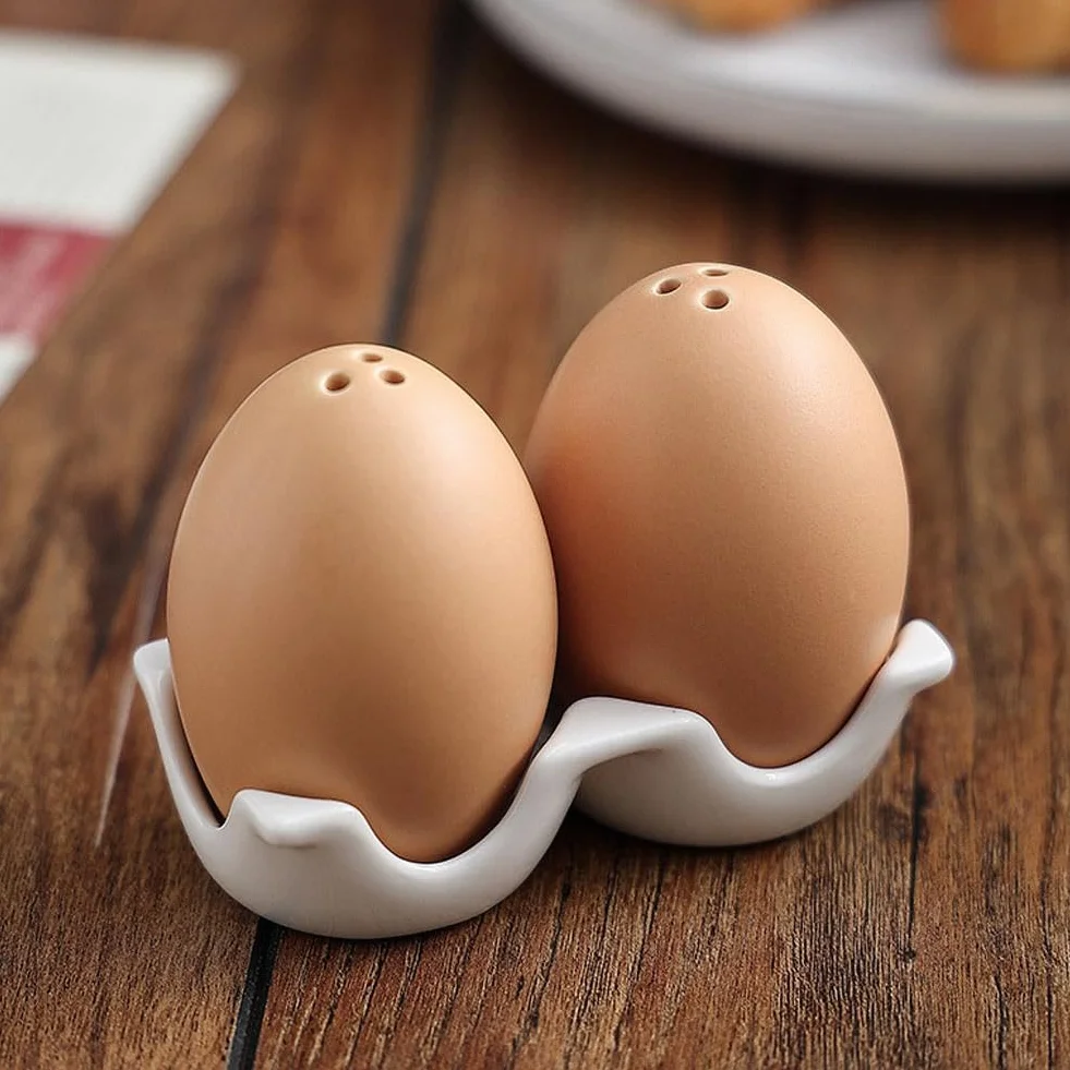 Ensemble salière et poivrière en céramique forme d'œuf, pot à épices amusant, mini shaker marron avec support