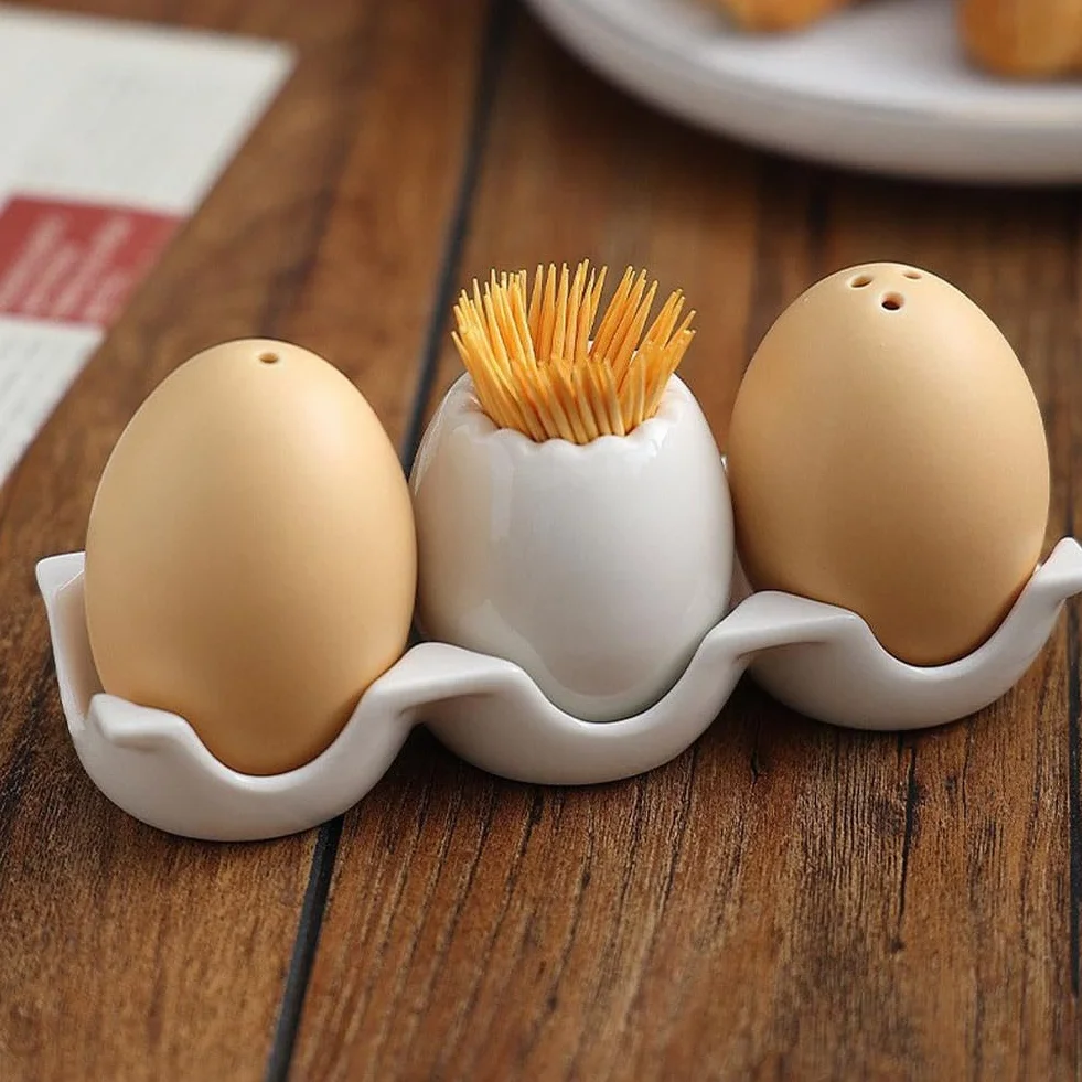 Ensemble salière et poivrière en céramique forme d'œuf, pot à épices amusant, mini shaker marron avec support
